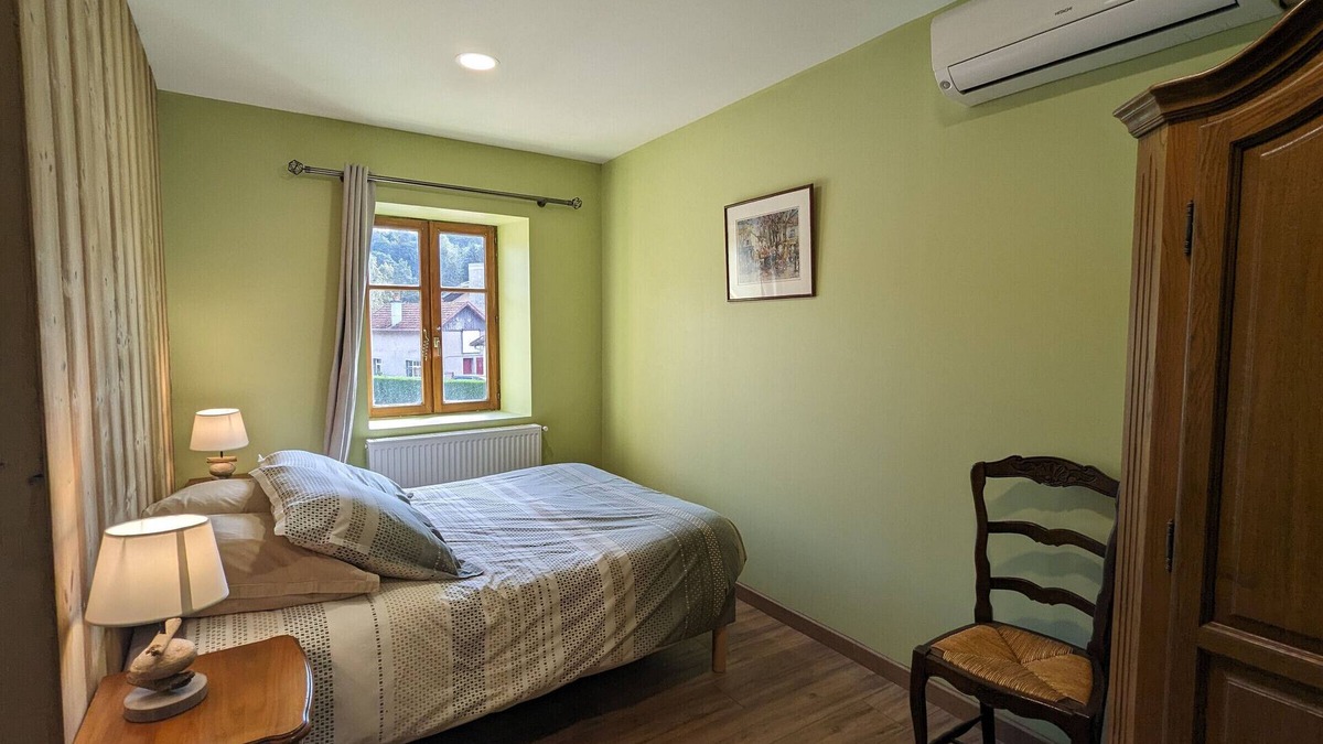 Rehaupal Bed & Breakfast | Air-conditioned family room with garden access
