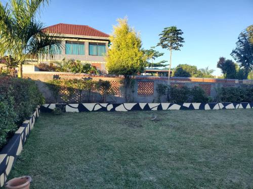 Entebbe Villa | Alice Gardens and Campsite