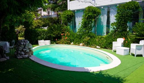 Montesilvano House | Alisea - Camere in villa con Piscina e parcheggio gratuito