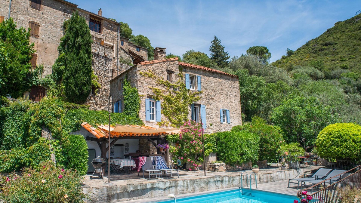 Vieussan Cottage | An authentic stone house, pool, beautiful garden and stunning views
