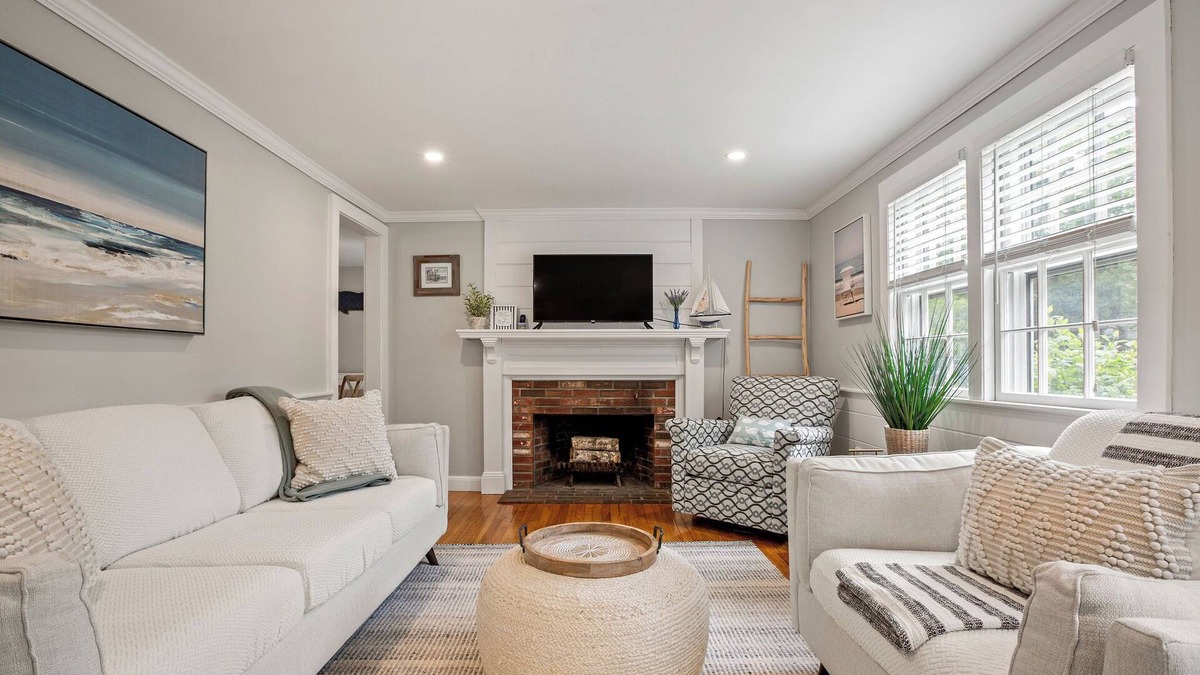 South Dennis House | An elevated Cape Cod escape close to coveted beaches with fully fenced yard, new deck and firepit