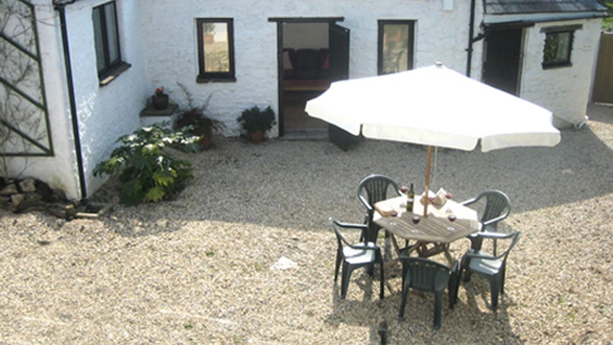 St Hilary House | ancient stone detached structure with own walled courtyard