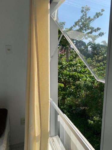 Cachoeira do Bom Jesus Apartment | Ap perto da praia, garagem privativa e wifi