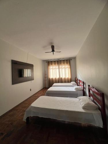 Patos de Minas Apartment | Apartamento 104 - Suíte econômica com ventilador