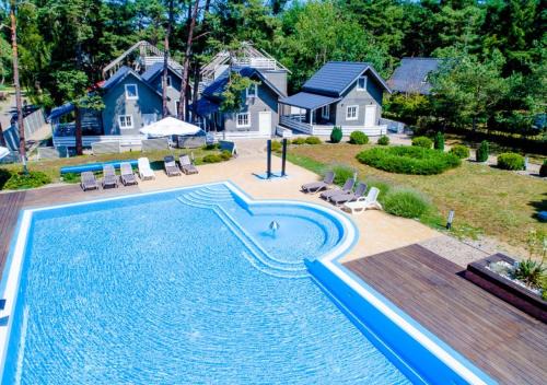 Niechorze Resort | APARTAMENTY przy plaży z basenem z podgrzewaną wodą i mini SPA - Ośrodek Kolonijno-Wczasowy Mewa