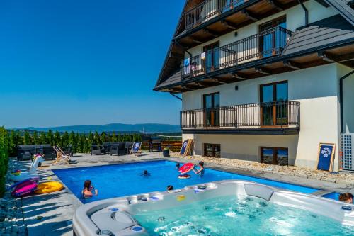 Bialka Tatrzanska Apartment | Aparthotel Rabiań-SKI ZEWNETRZNY BASEN ORAZ JACUZZI Z PODGRZEWANĄ WODĄ SALA ZABAW I DMUCHANIEC