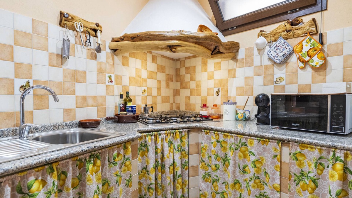 Baunei Apartment | Apartment 'Appartamento Domm'e Orrosaria' with Mountain View, Balcony and Air Conditioning