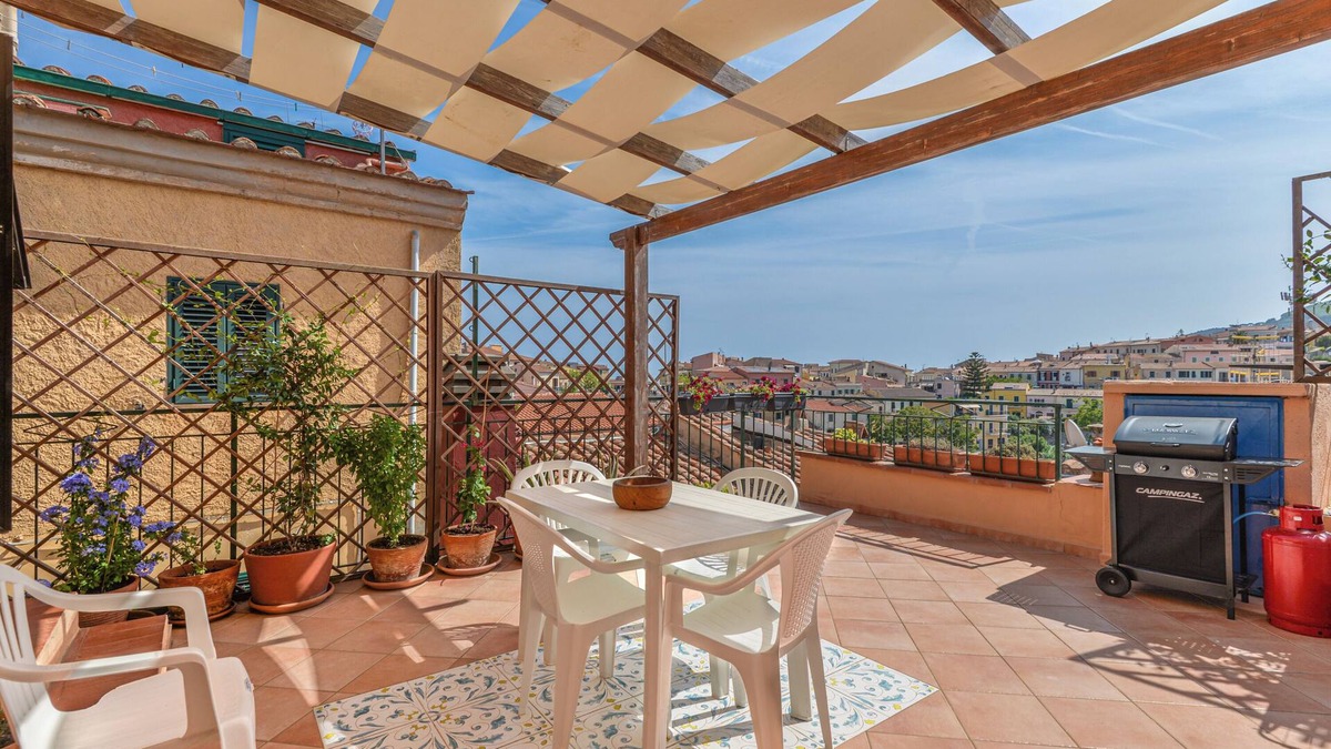 Capoliveri Apartment | Apartment 'Casa La Torre' with Sea View, Shared Terrace and Wi-Fi