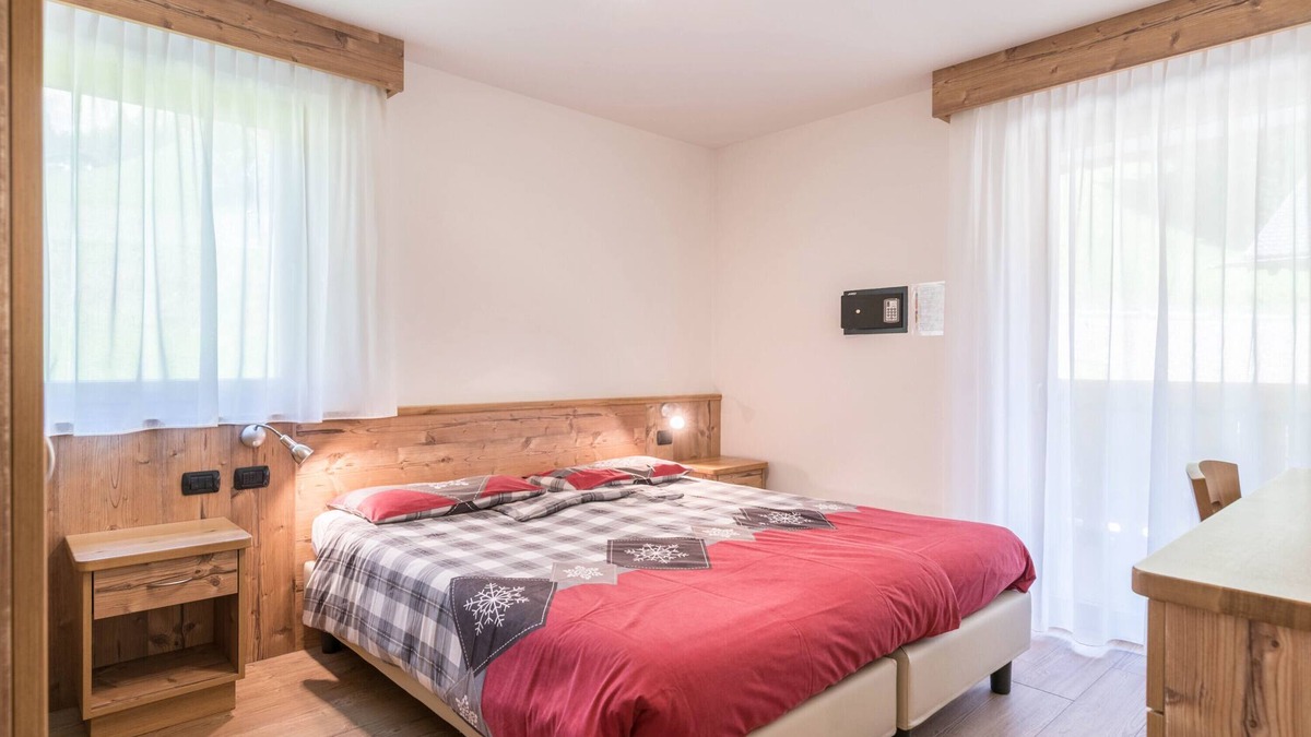 Canazei Apartment | Apartment Ciasa Rosa with Mountain View, Balconies & Shared Garden