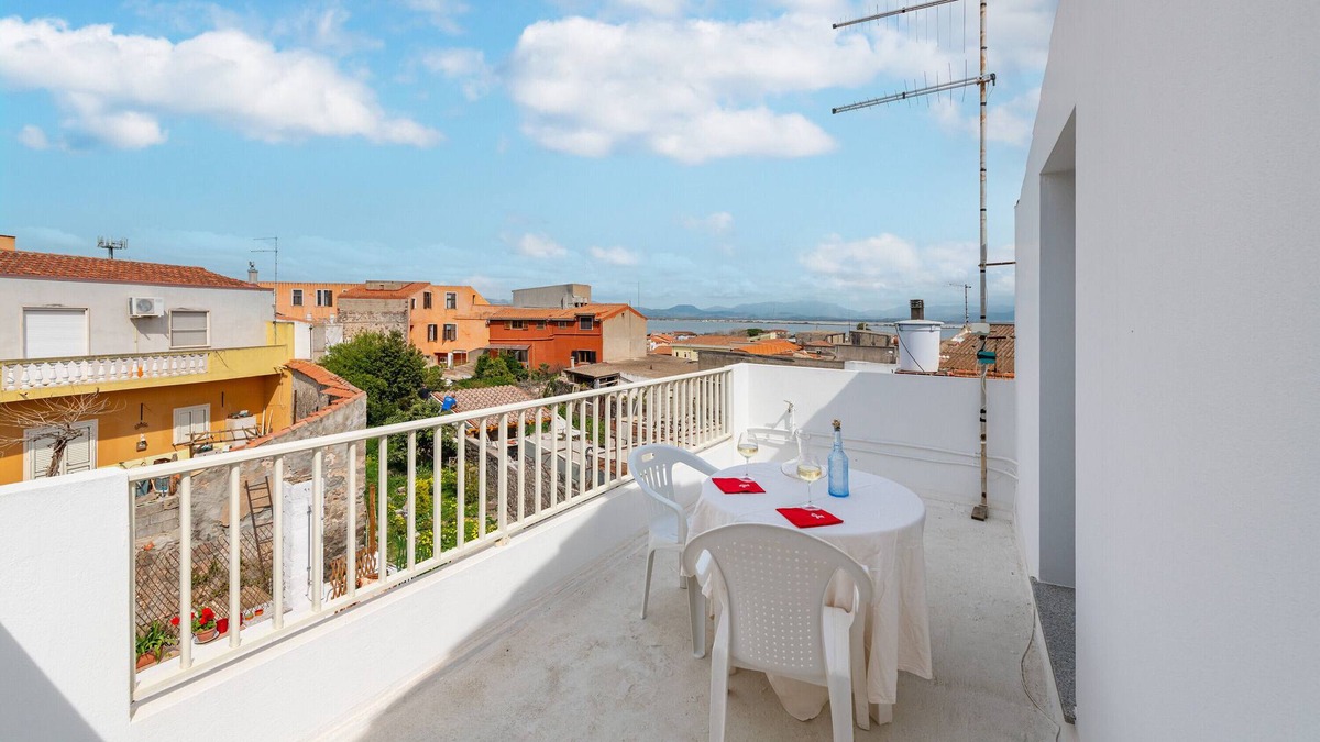 Sant'Antioco Apartment | Apartment 'Domo De Maria' with Sea View, Private Terrace and Air Conditioning