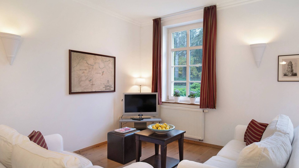 Gingst Apartment | Apartment 'Gut Rattelvitz - Parterre Mitte' with Sea View, Private Terrace and Wi-Fi