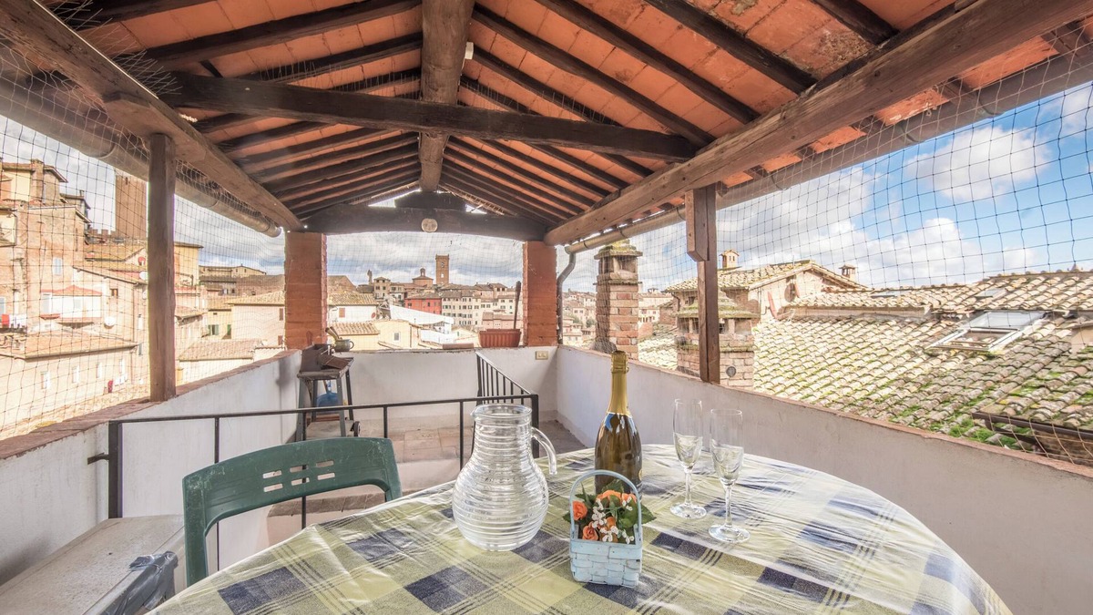 Siena Historical Center Apartment | Apartment 'Il Campo Comfort Apt with Balcony' with Private Terrace, Wi-Fi and Air Conditioning