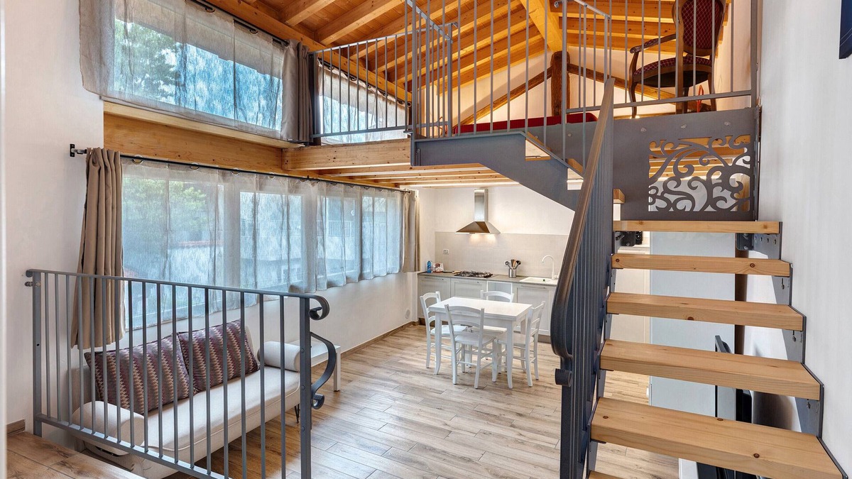 Portese Apartment | Apartment 'Soppalco - Isola Trimelone' with Shared Pool, Wi-Fi and Air Conditioning