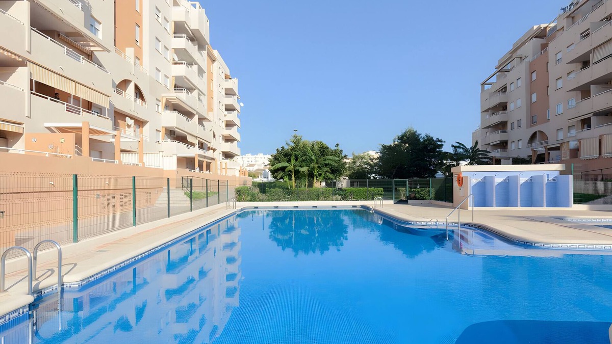 Grao de Gandia Apartment | Apartment 'Jardines De Playa Gandia' with Shared Pool, Wi-Fi and Air Conditioning