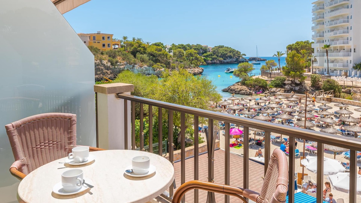 Cala Ferrera Apartment | Apartment Playa Marina with Sea View, Balcony, Shared Pool & Wi-Fi