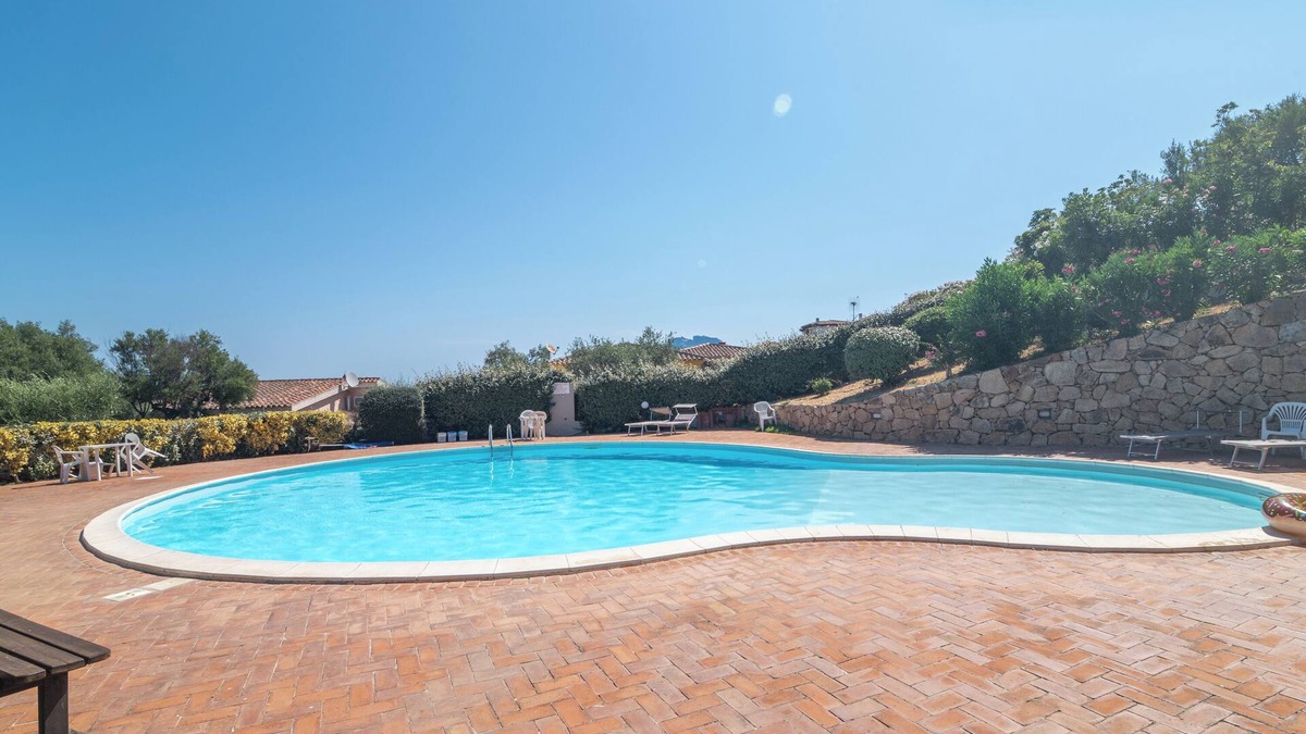Porto San Paolo Apartment | Apartment 'Tavolara Porto San Paolo E2' with Sea View, Shared Pool and Air Conditioning