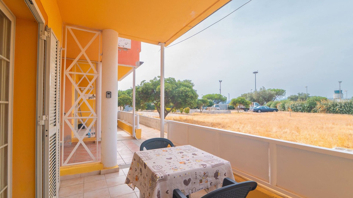 Olbia Apartment | Apartment 'The Lion's Head' with Private Terrace, Wi-Fi and Air Conditioning
