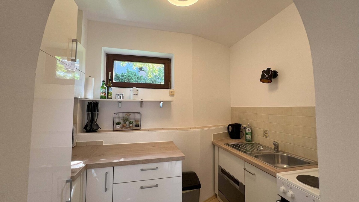 Bad Aussee Apartment | Apartment Theresa | Kitchen | Parking | Garden