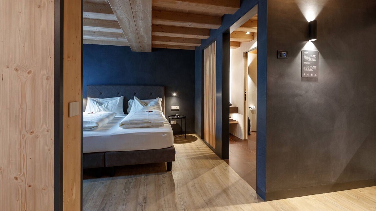 Livigno Ski Chalet | Apartment 'Wind Villa Genf' with Mountain View, Shared Spa Area and Garden