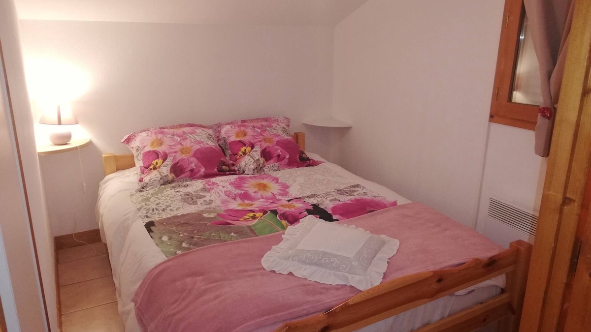 Praz-sur-Arly Apartment | Apartment with mezzanine near ski lifts and village center.