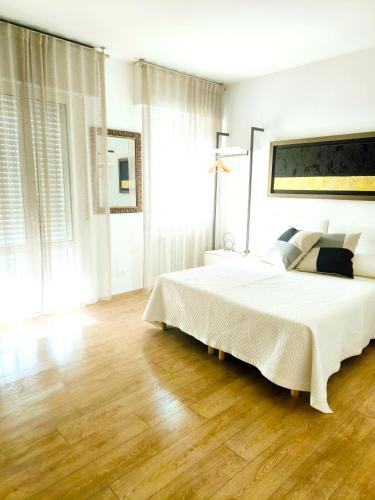 Osteria Grande House | Appartamento "Laghetto 1" con tre camere e bagni privati cucina in condivisione