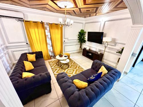 Douala Apartment | Appartement 2 et 1 chambres salon balcon canal sat wifi Netflix parking gardien 24 sur 24