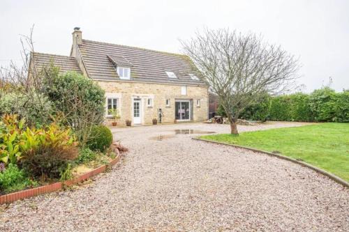 Sainte-Marie-du-Mont Apartment | Appartement cosy à Sainte-Marie-du-Mont avec jardin 25m²