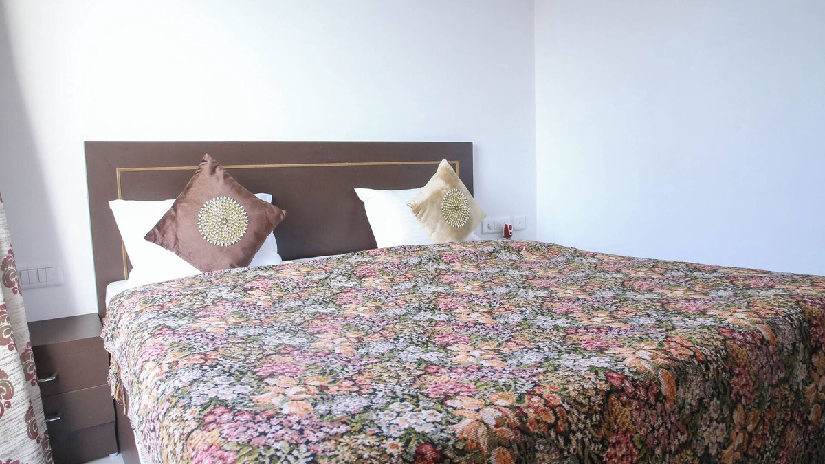 Taj Ganj Bed & Breakfast | Aradhana's Home Stay Deluxe Room with Balcony.