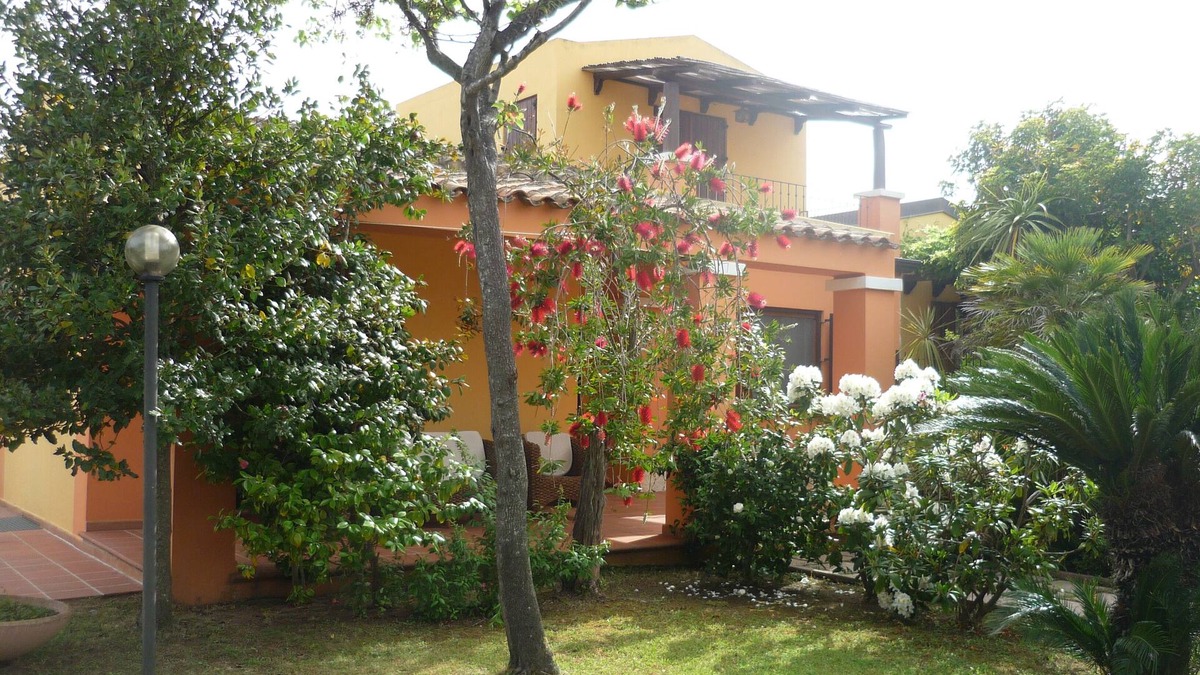 Arbatax Villa | arbatax tortoli: elegant and prestigious villa with green lawn and flowers