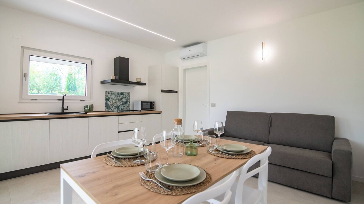 Borgo Milano Apartment | Armonia Suites Terra, new apartment with garden and pool in Verona