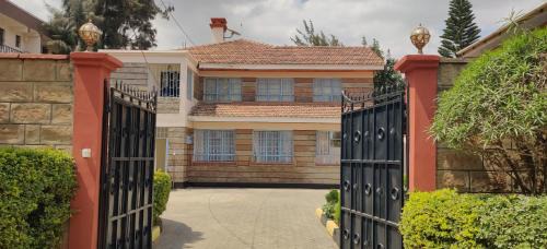 Syokimau Villa | Axis Garden Suites 8-Bedroom Villa Near JKIA & SGR Sleeps 16 Private Garden Retreat in Syokimau