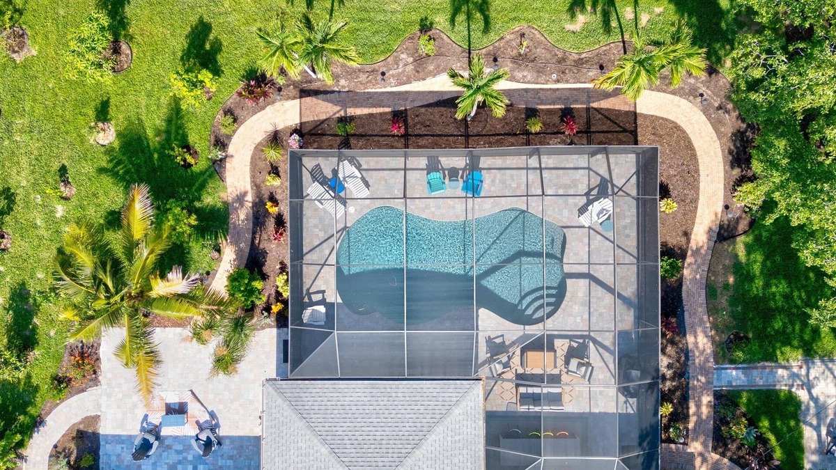 Palma Sola House | Backyard Paradise! Saltwater Pool, Games, Fire Pit