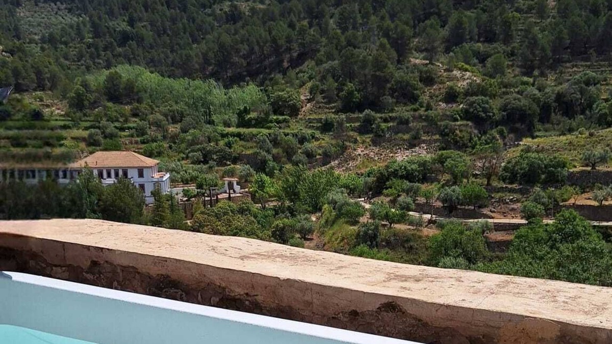 Alcoleja House | "Balcón de Aitana" : rural house with large terrace, jacuzzi and mountain views.
