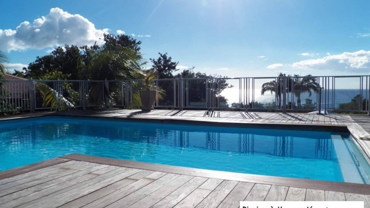 Deshaies Apartment | Bamboo apartment in a postcard setting overlooking the Caribbean Sea