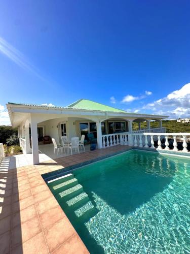 East End Village House | Barefoot Luxury Beach Villa