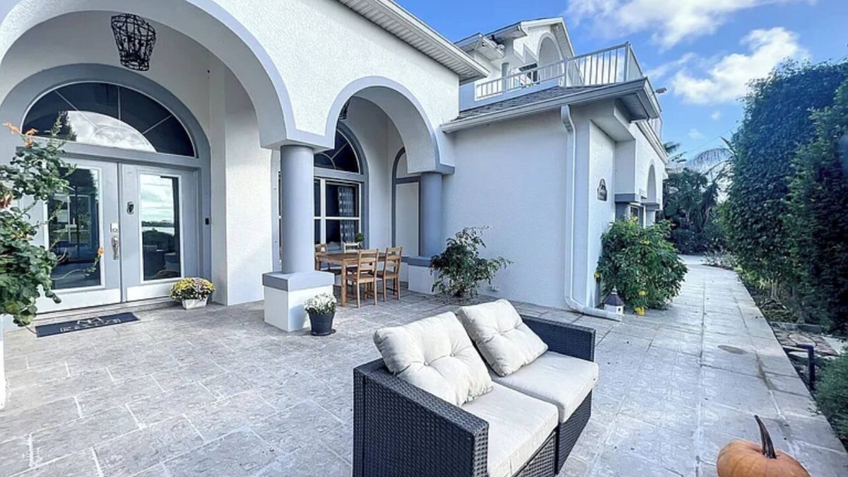 Merritt Island Villa | Barrier island water front luxury villa w dock near beaches and Disney Orlando