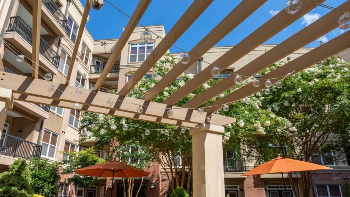 Cary Apartment | Barsala l 2BD Oasis at Arboretum: Stylish & Scenic Views