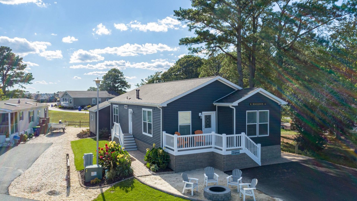 Long Neck House | Bay front retreat - beach, pools, pet friendly!