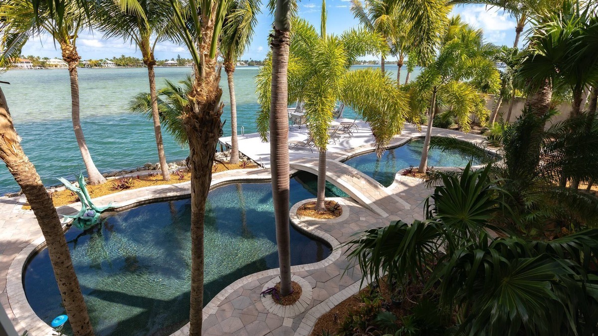 Sugarloaf Shores House | Bayside Beauty: Tropical Paradise 3BR Home, Panoramic Open Water Views, Grotto Pool, Dog-Friendly