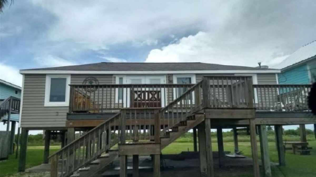 Matagorda House | Beach and river view cottage with deck and specatuclar views.