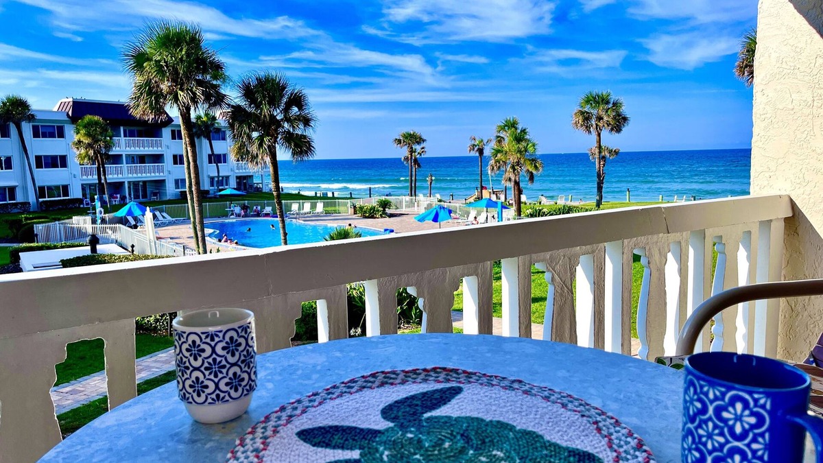 New Smyrna Beach Condo | Beach front condo with gorgeous views of the large pool and the Atlantic waves.