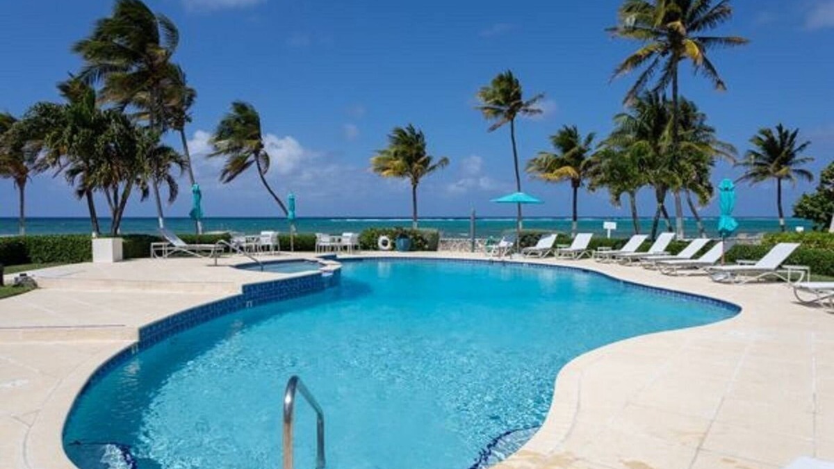 West Bay Condo | Beach front unit 2 bedroom/2 bath - steps to the beach or pool! Sleeps 5.