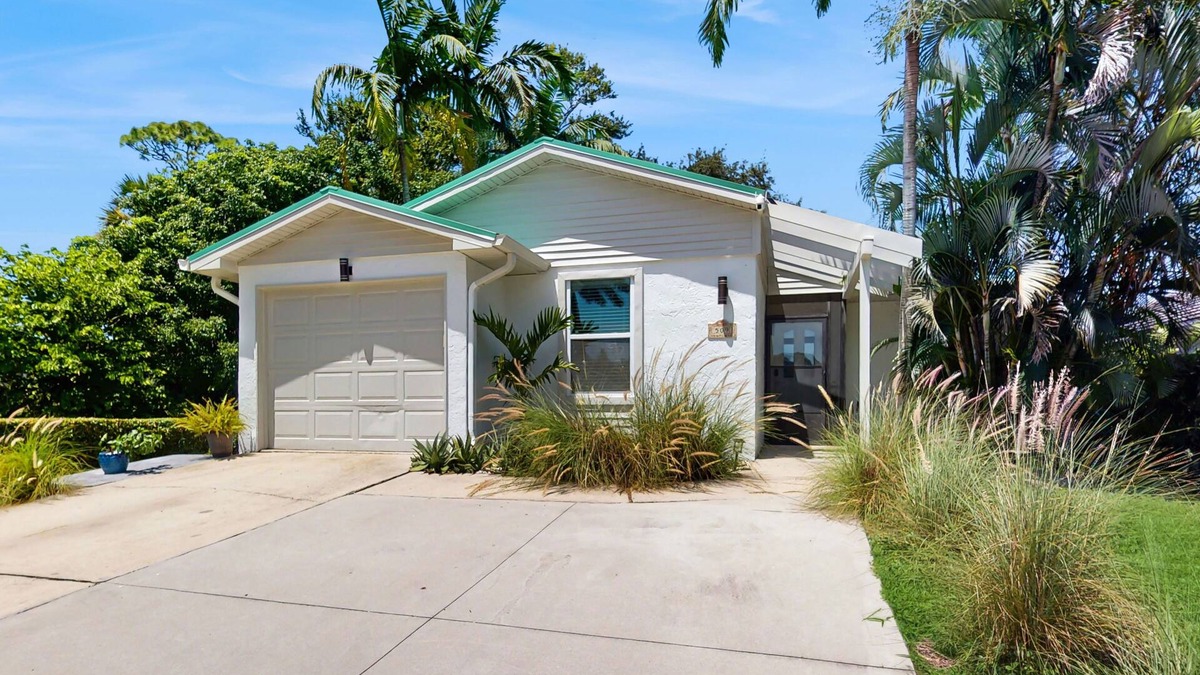 Naples Park House | Beach home with outdoor sundeck, hot tub, enclosed yard & patio