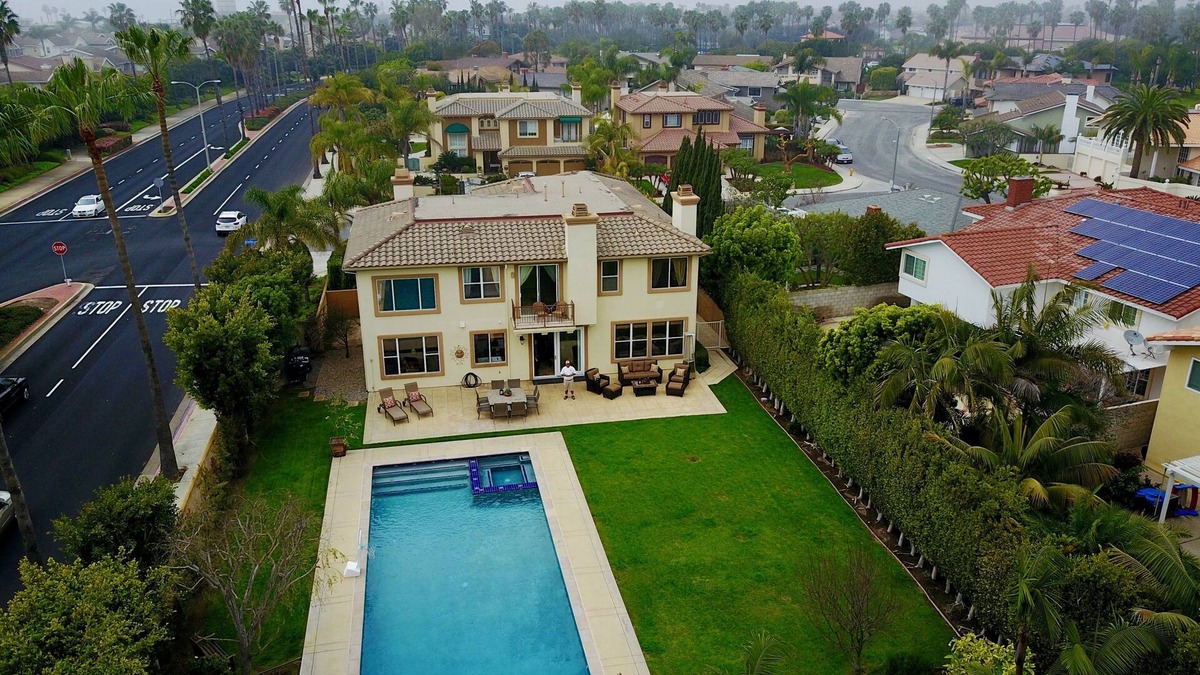 Huntington Beach House | Beach Living 15,000sf Resort Property 5 min walk to beach.