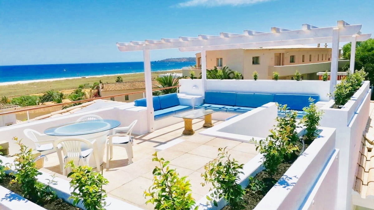 Meia Praia Apartment | Beachfront Apartment with Private Roof Terrace, BBQ, and Sea views