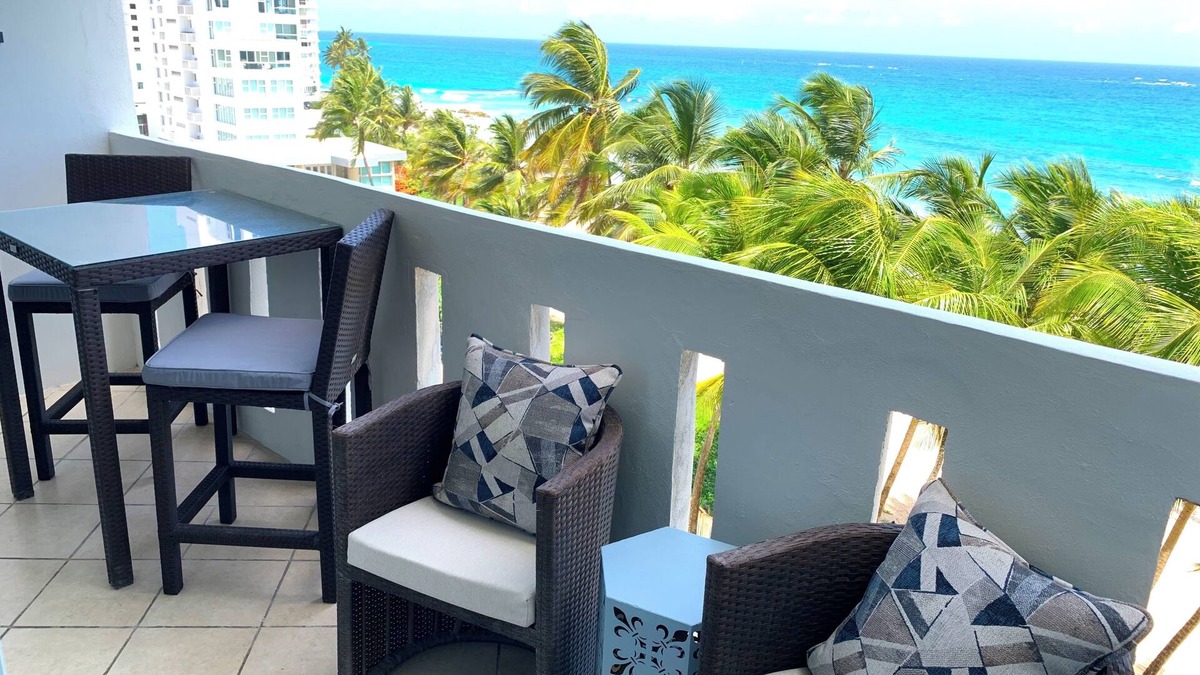 San Juan Apartment | Beachfront Oceanview 2-suite condo with balcony, AC, WiFi, Pool, Fitness Room