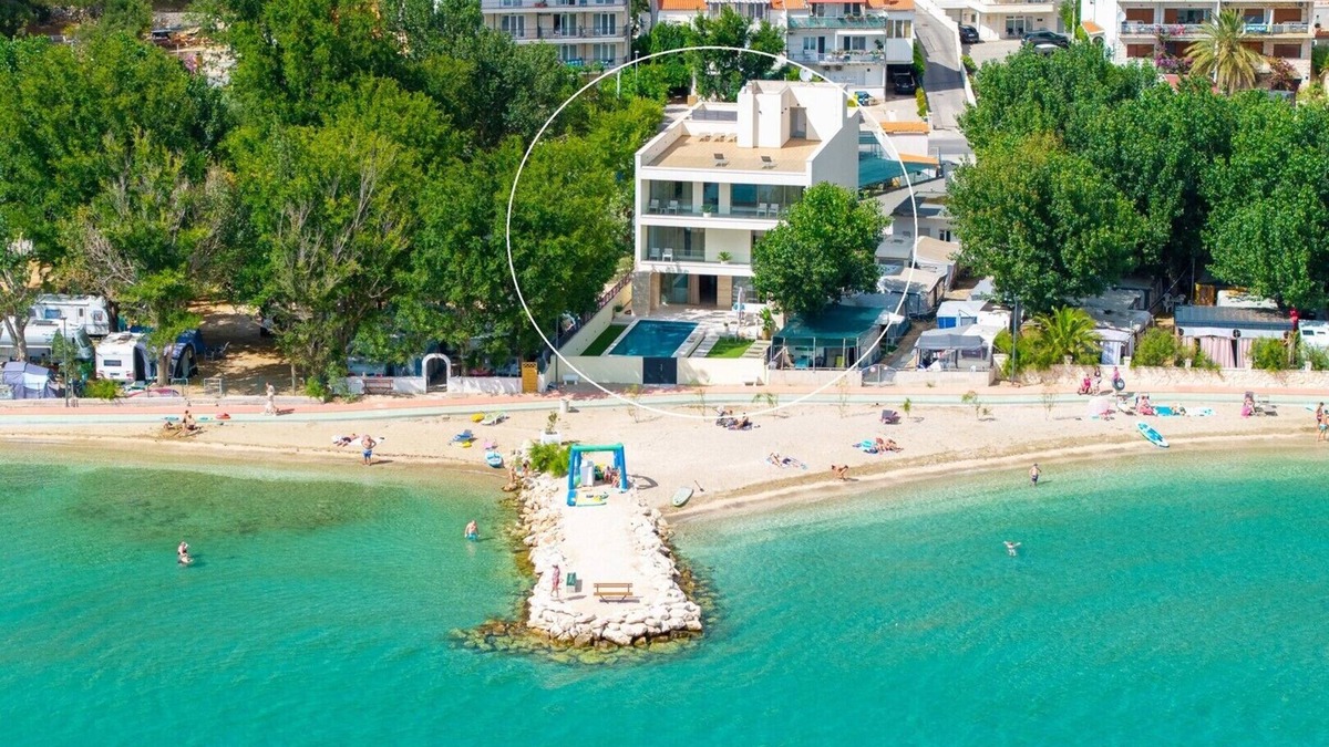 Duce Villa | Beachfront Villa Erce with private 40sqm heated pool, a Gym, 7 en-suite bedrooms, a rooftop terrace, 2 living areas