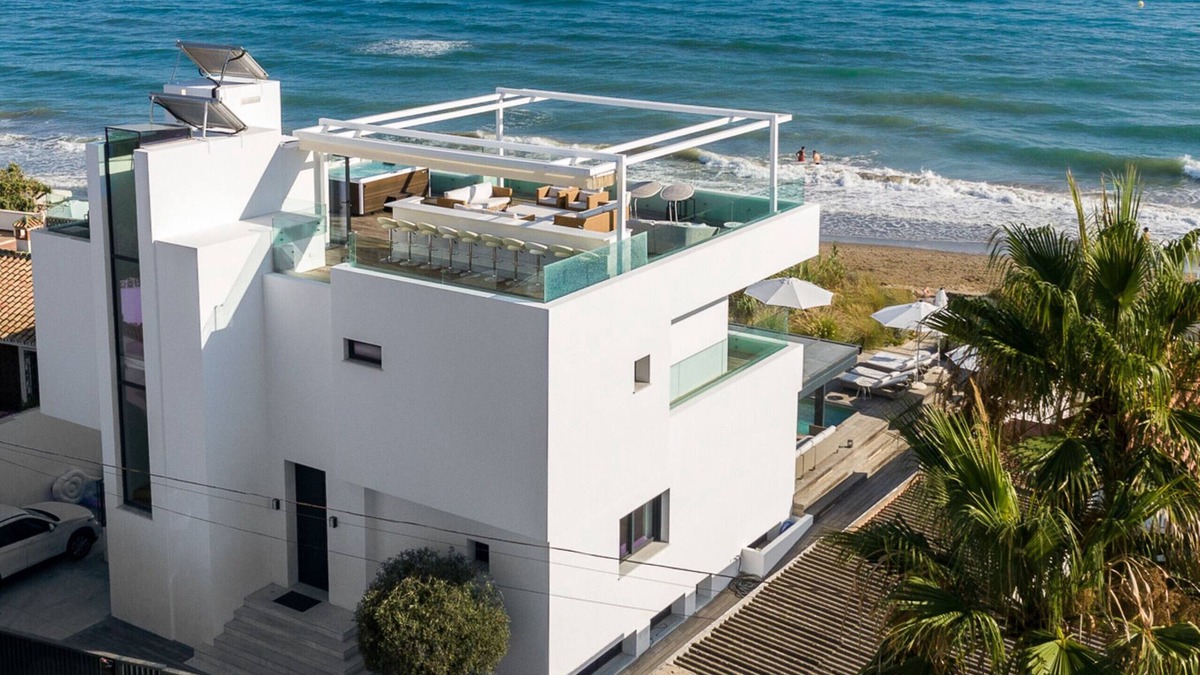 Urbanizacion Costabella Villa | Beachfront Villa with Heated Pool & Spa