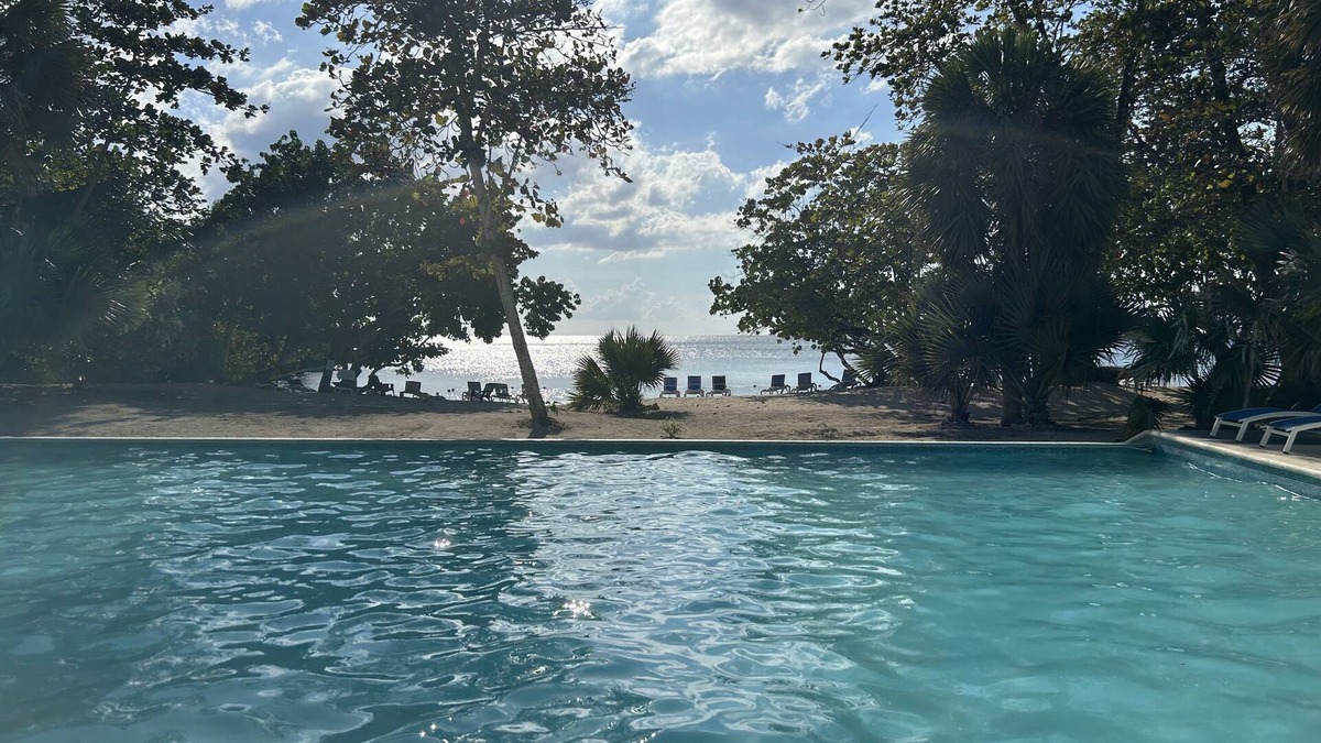 Orange Bay Villa | Beachhouse Villa located on a small bluff on a private beach. Ideal for families