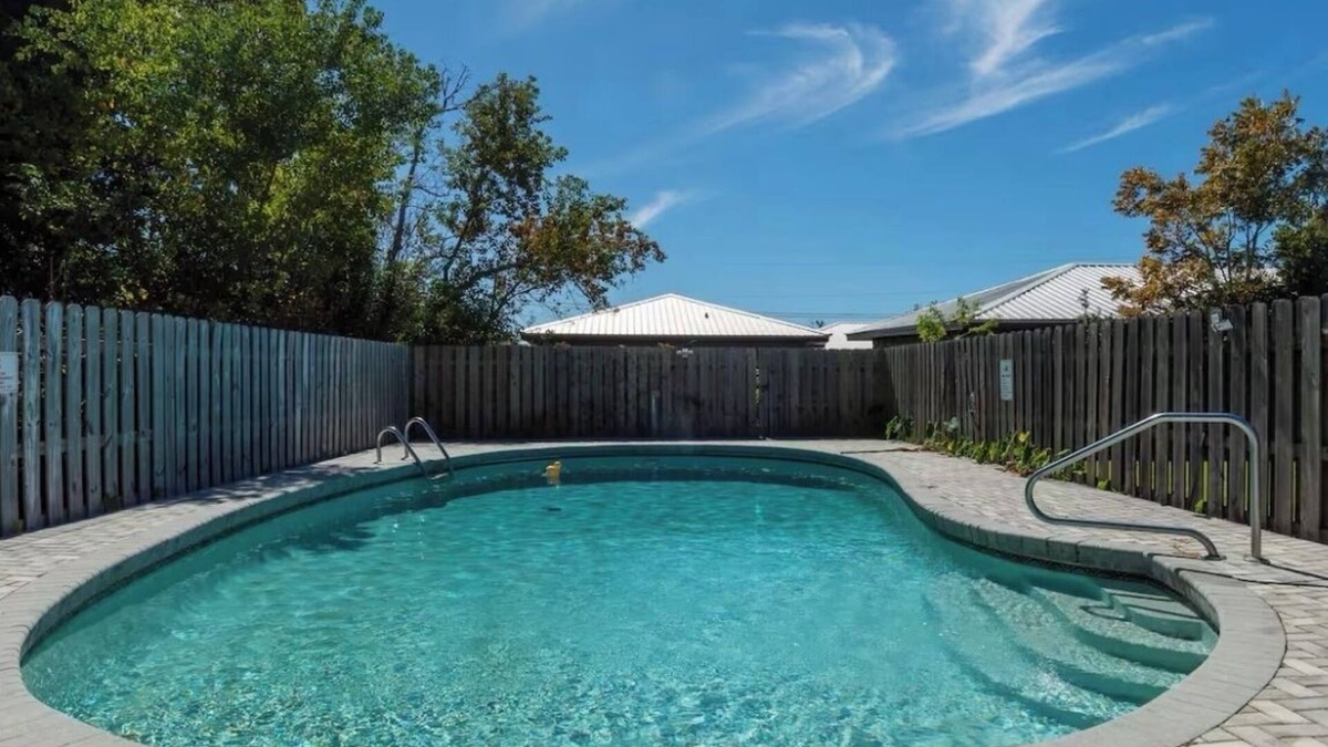 Highland City Apartment | Beachy Poolside Palm nestled between PCB, Mexico Beach and downtown PC.